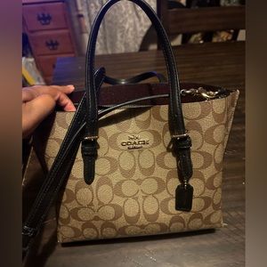 Coach crossbody bag.